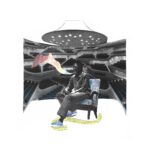 Collage of composer Julius Eastman seated in an ornate armchair inside the tiered concert hall of the Elbphilharmonie in Hamburg, framed by colorful iridescent cut-out shapes.